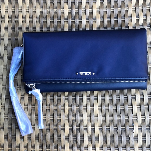 Tumi Handbags - Final price—NWT Tumi Voyageur Travel Wallet